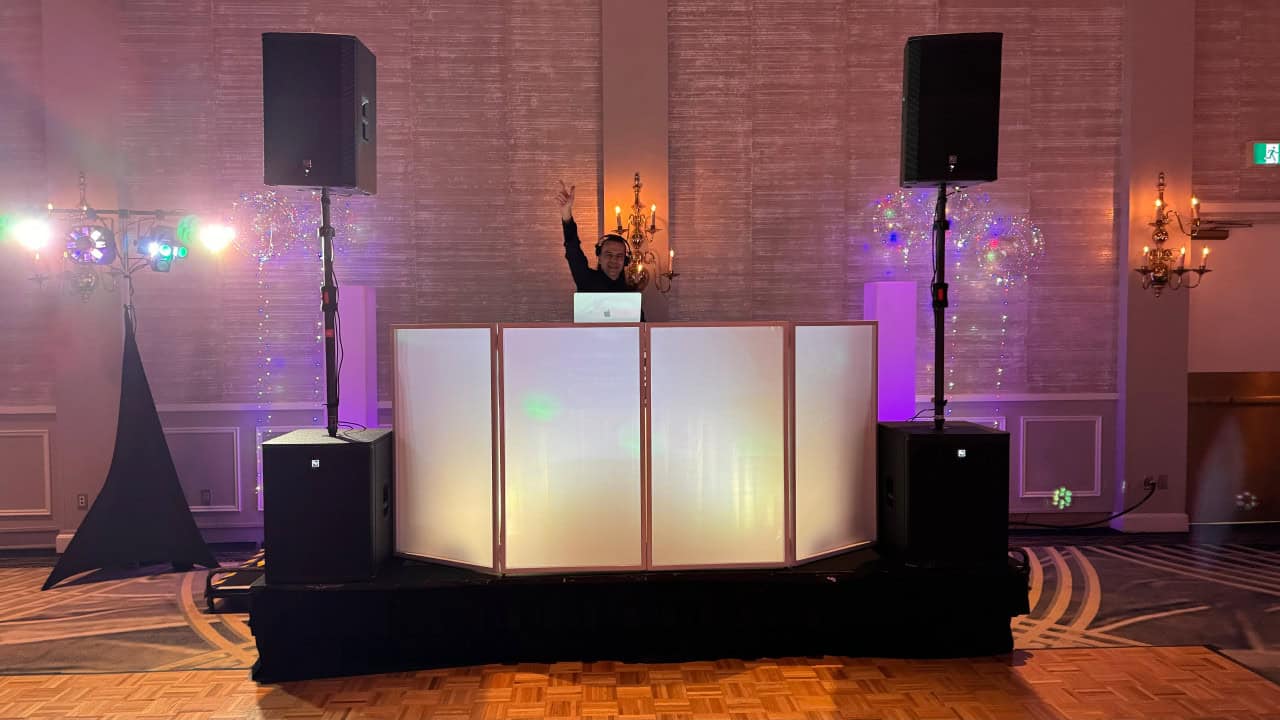 DJ Ivan – Corporate Event DJ Toronto – Disc Jockeys Unlimited DJ Ivan of Disc Jockeys Unlimited at a corporate holiday event in Toronto